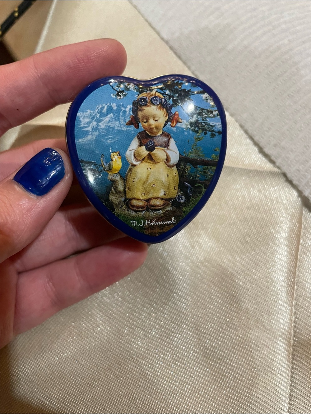 Urban Outfitters Blue Heart-Shaped M.J. Hummel trinket box with angel print